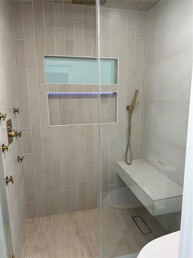 708 SE 3rd Ave Unit 201, Hallandale Beach, FL 33009 - full bathroom with toilet and tiled shower