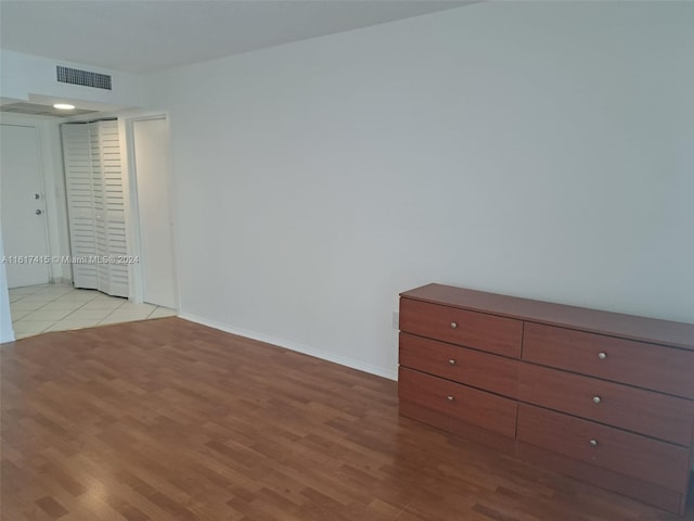 unfurnished bedroom featuring light hardwood / wood-style floors