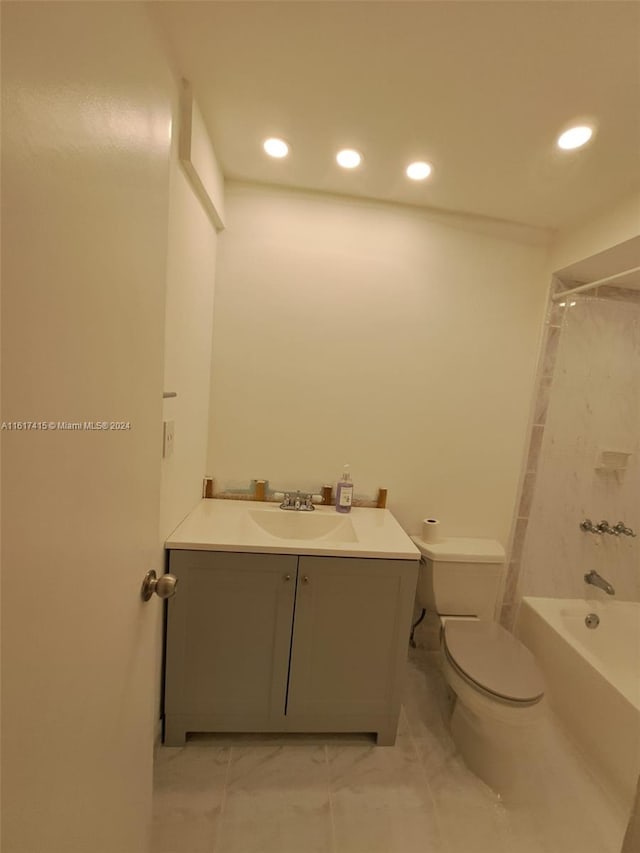 full bathroom with vanity, tub / shower combination, tile patterned flooring, and toilet