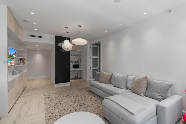 living room featuring light parquet floors