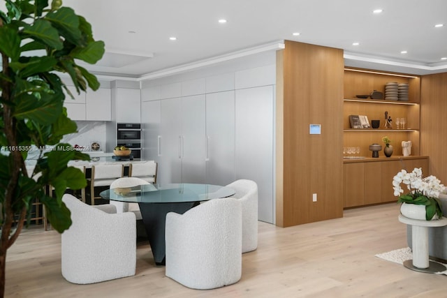 dining room with light hardwood / wood-style flooring