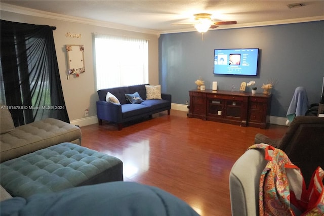 living room featuring ceiling fan, hardwood / wood-style floors, and ornamental molding