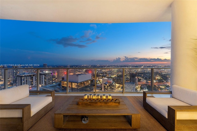 view of balcony at dusk