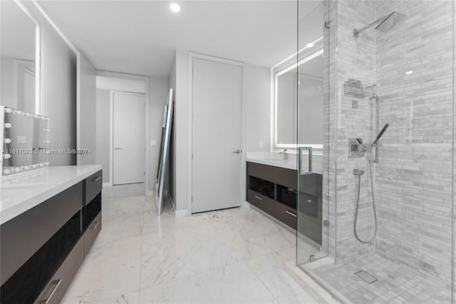 bathroom with vanity, an enclosed shower, and tile patterned floors