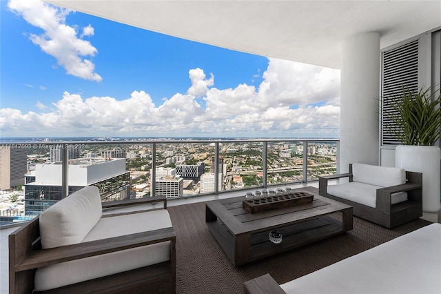 851 NE 1st Ave Ph 5312, Miami, FL 33132 - balcony featuring outdoor lounge area and a city view