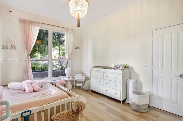 bedroom with light hardwood / wood-style floors