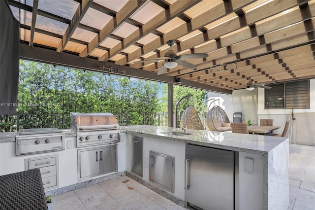 view of patio / terrace with ceiling fan, a grill, and area for grilling