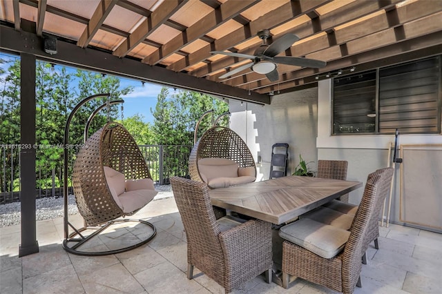 view of patio / terrace with a pergola and ceiling fan