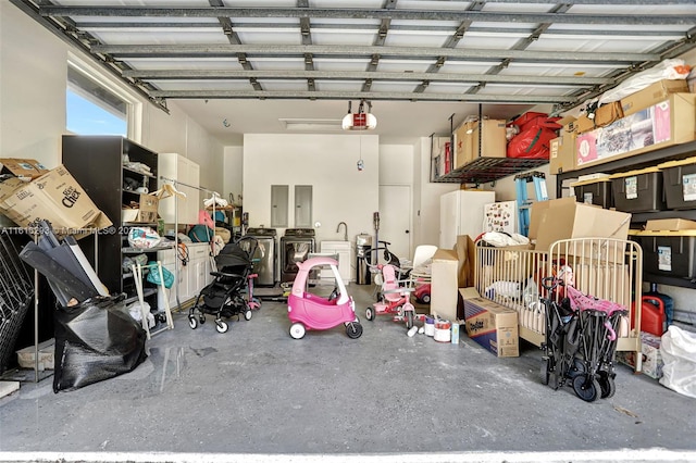 garage featuring electric panel and a garage door opener