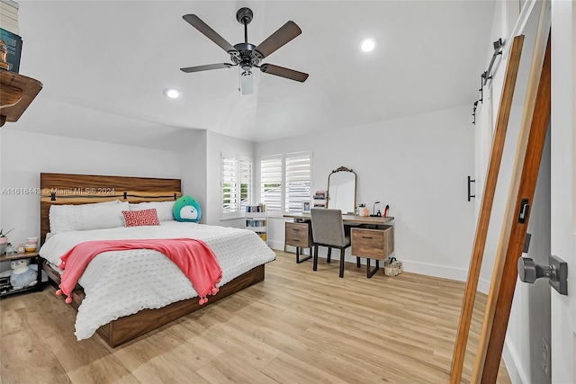 bedroom featuring light wood-type flooring and ceiling fan