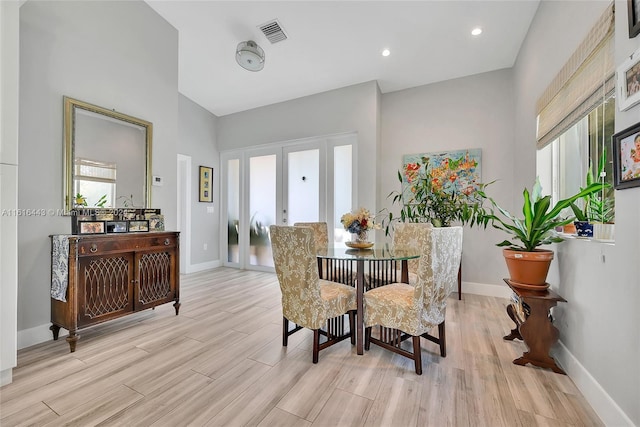 dining space featuring french doors