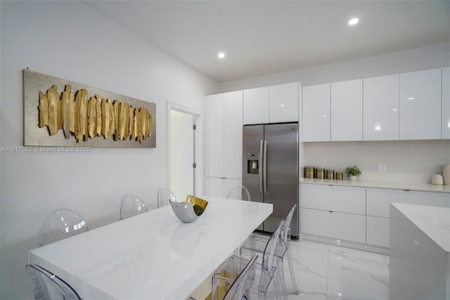 dining room with light tile patterned floors