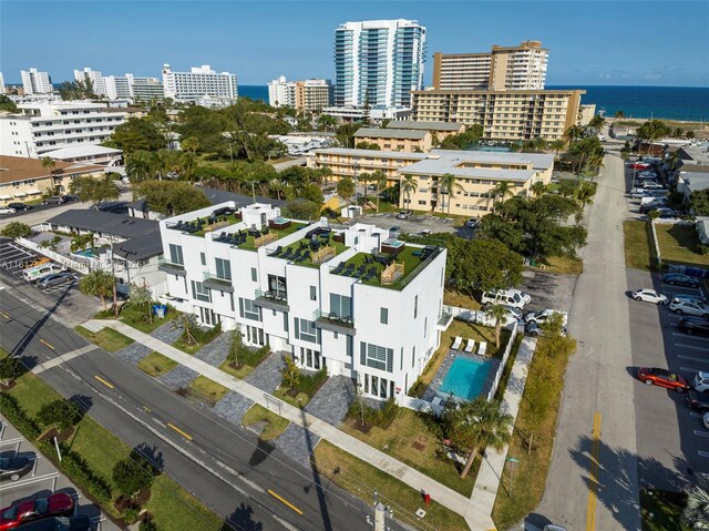 bird's eye view with a water view