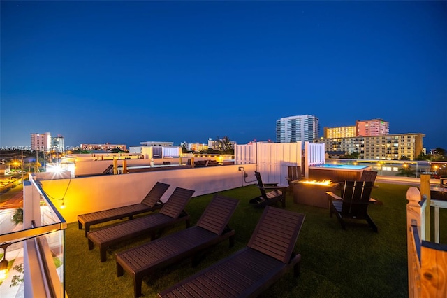 patio at night with a yard