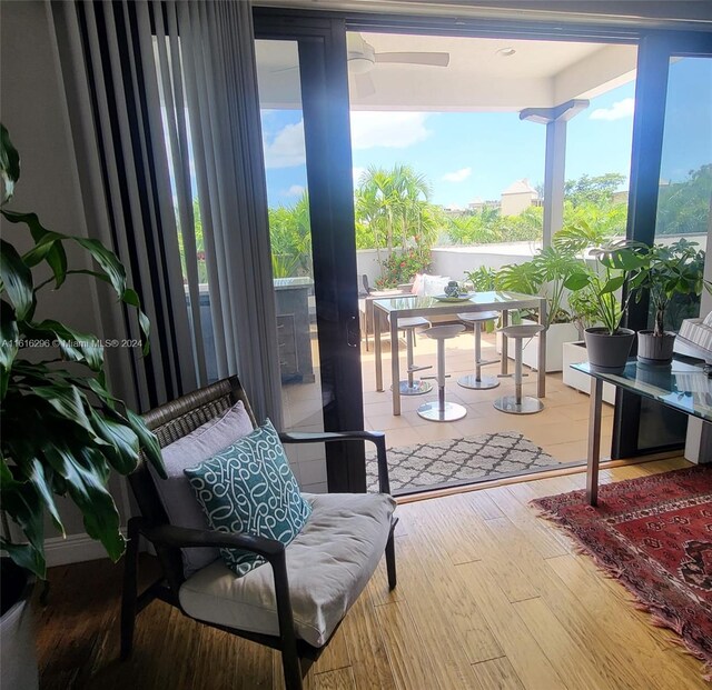 interior space featuring plenty of natural light and hardwood / wood-style flooring