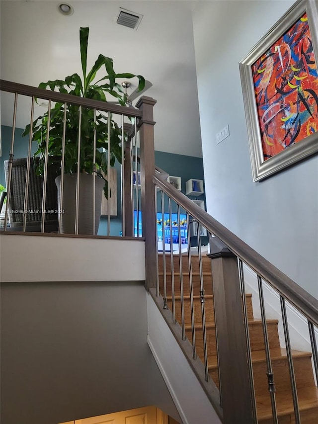 staircase with visible vents