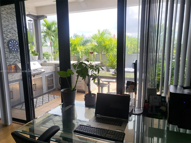 dining space with a healthy amount of sunlight and tile patterned floors