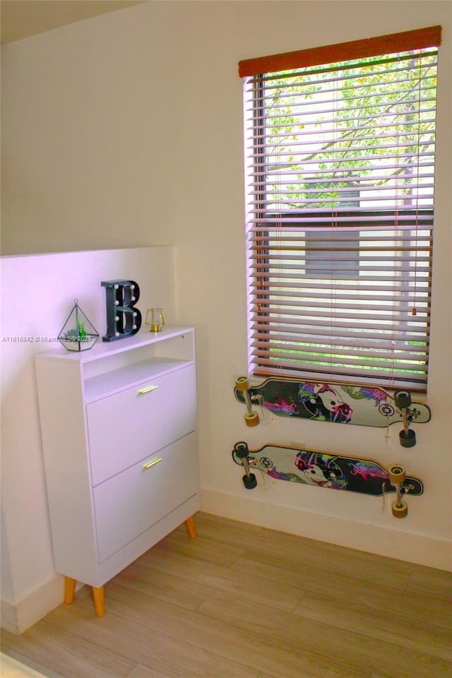 bedroom featuring light wood-type flooring