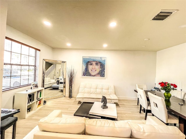 living room featuring light hardwood / wood-style floors