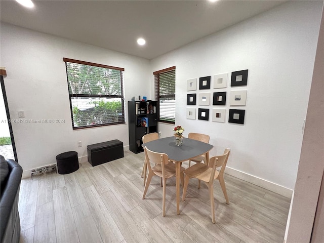 dining room with light wood-type flooring