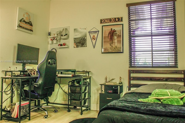 bedroom featuring hardwood / wood-style flooring