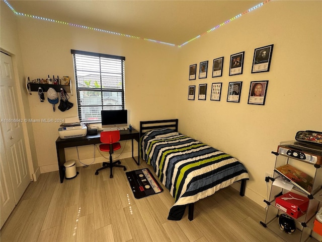 bedroom with light hardwood / wood-style flooring