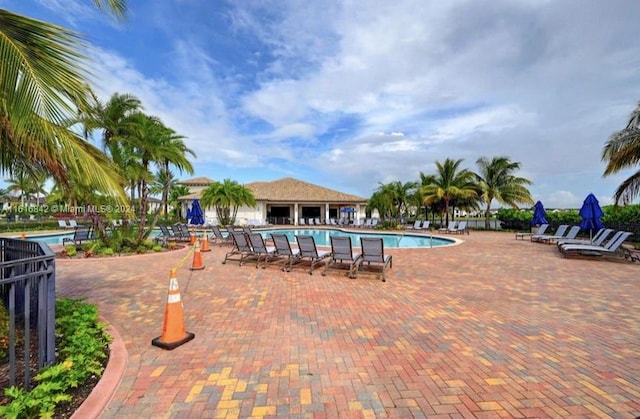 view of swimming pool featuring a patio area