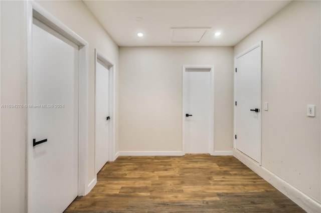 hallway featuring wood-type flooring