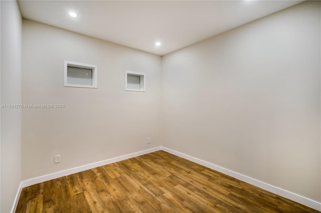 empty room featuring wood-type flooring