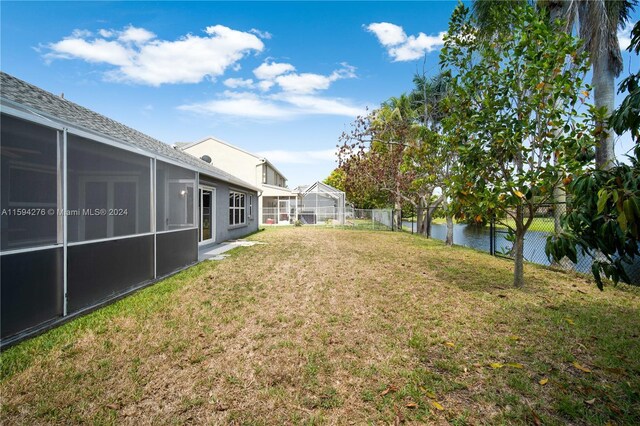 view of yard with a water view