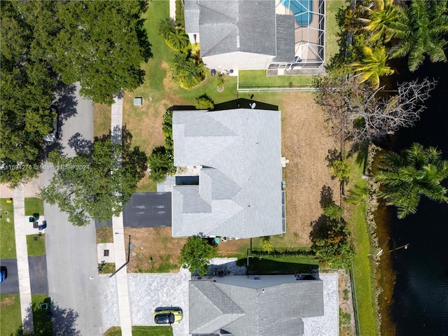 drone / aerial view featuring a water view