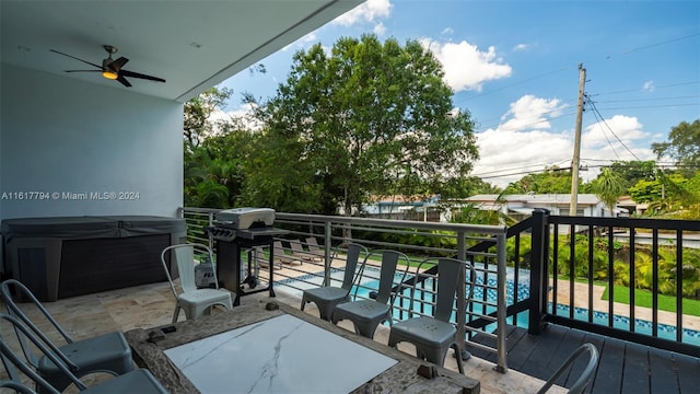 exterior space featuring ceiling fan, a balcony, and area for grilling