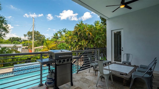 balcony featuring area for grilling and ceiling fan