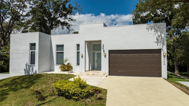 modern home with a front yard