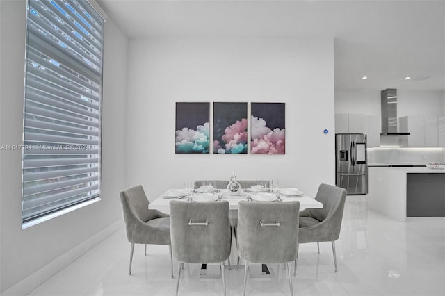 dining room featuring light tile patterned flooring