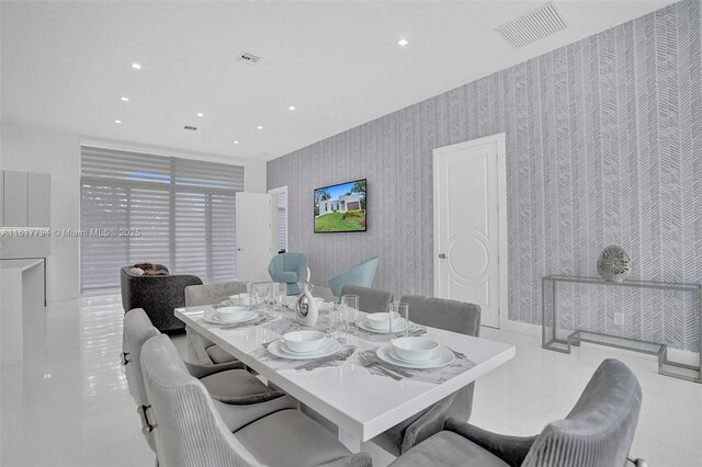 dining area with light tile patterned flooring