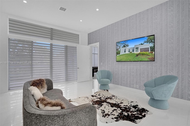 sitting room featuring tile patterned flooring