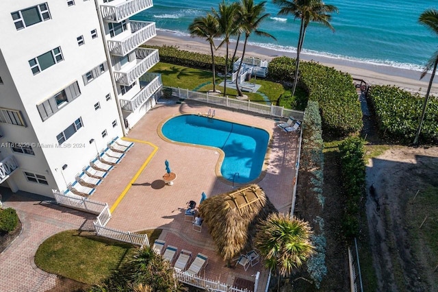 aerial view with a beach view and a water view