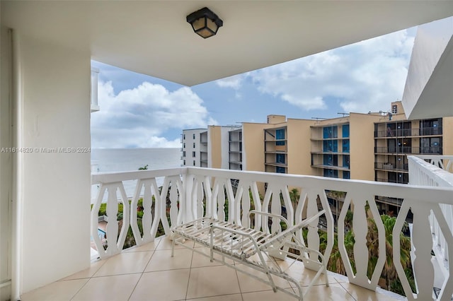 balcony featuring a water view