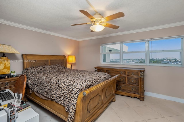 tiled bedroom featuring ornamental molding, a textured ceiling, and ceiling fan