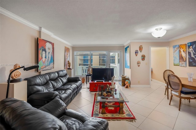 tiled living room featuring ornamental molding and a textured ceiling