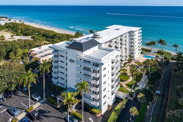 drone / aerial view with a view of the beach and a water view