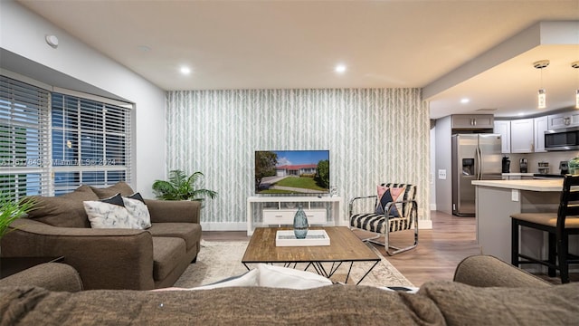 living room with light hardwood / wood-style floors