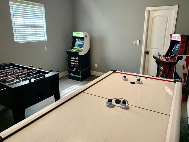 game room with hardwood / wood-style flooring