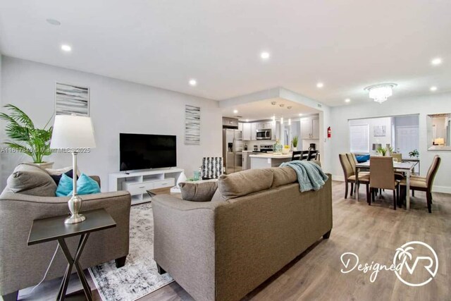 living room featuring light wood-type flooring