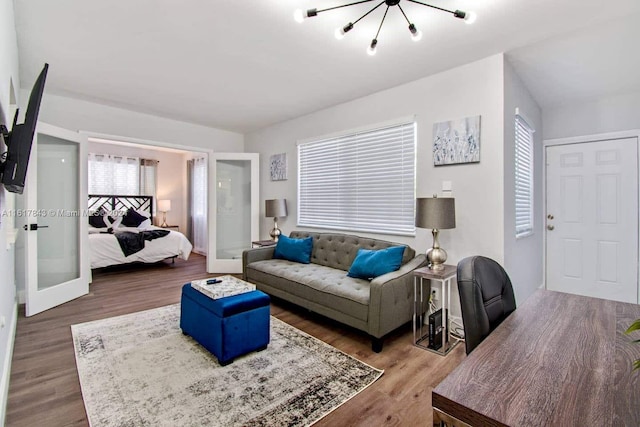 living room with hardwood / wood-style flooring and a wealth of natural light