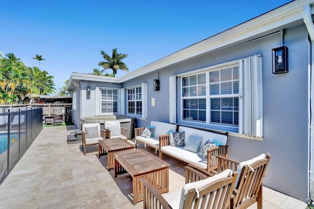 view of patio / terrace featuring a pool and an outdoor hangout area