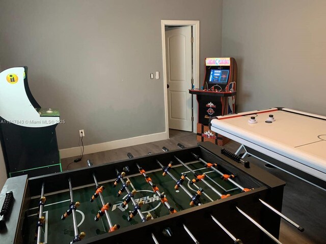 game room featuring hardwood / wood-style flooring