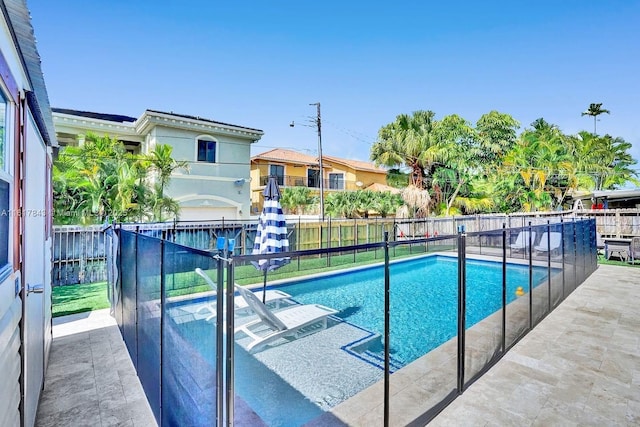 view of pool featuring a patio area