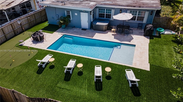 view of swimming pool featuring a patio area